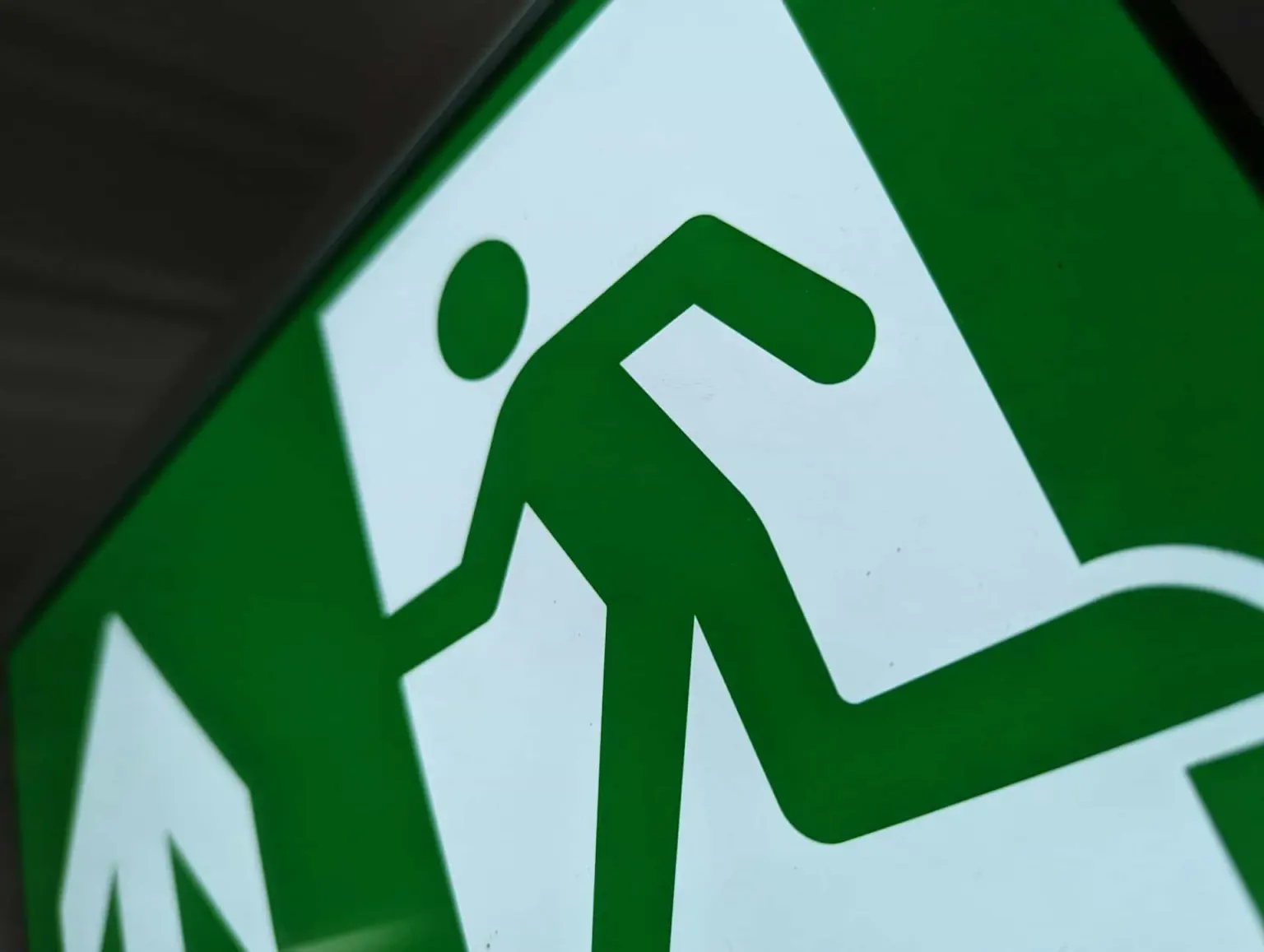 Traditional static green exit sign.